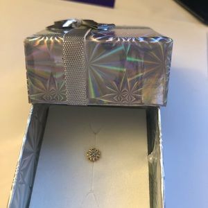 18 carat gold diamond nose pin.